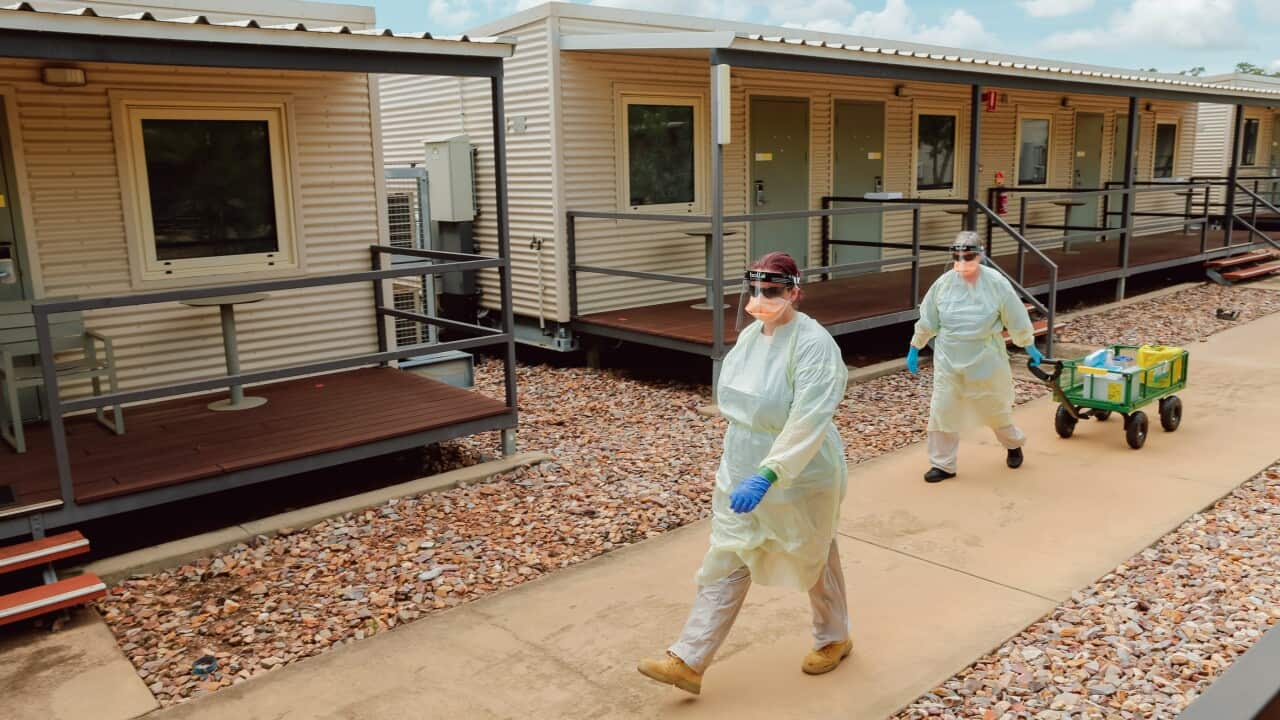 Staff conduct a Swabbing run at a PPE drill at the Howard Springs quarantine facility in Darwin. 