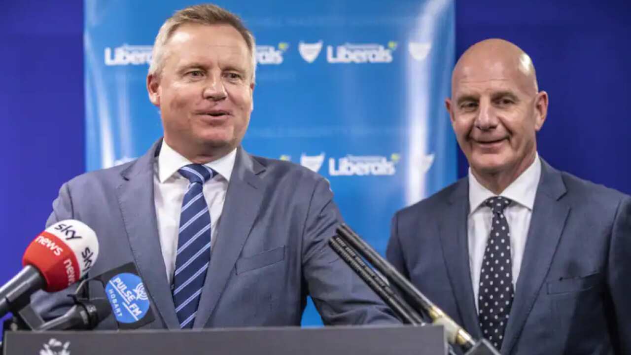 Jeremy Rockliff (left) has become Tasmania's premier following Peter Gutwein's (right) resignation. 