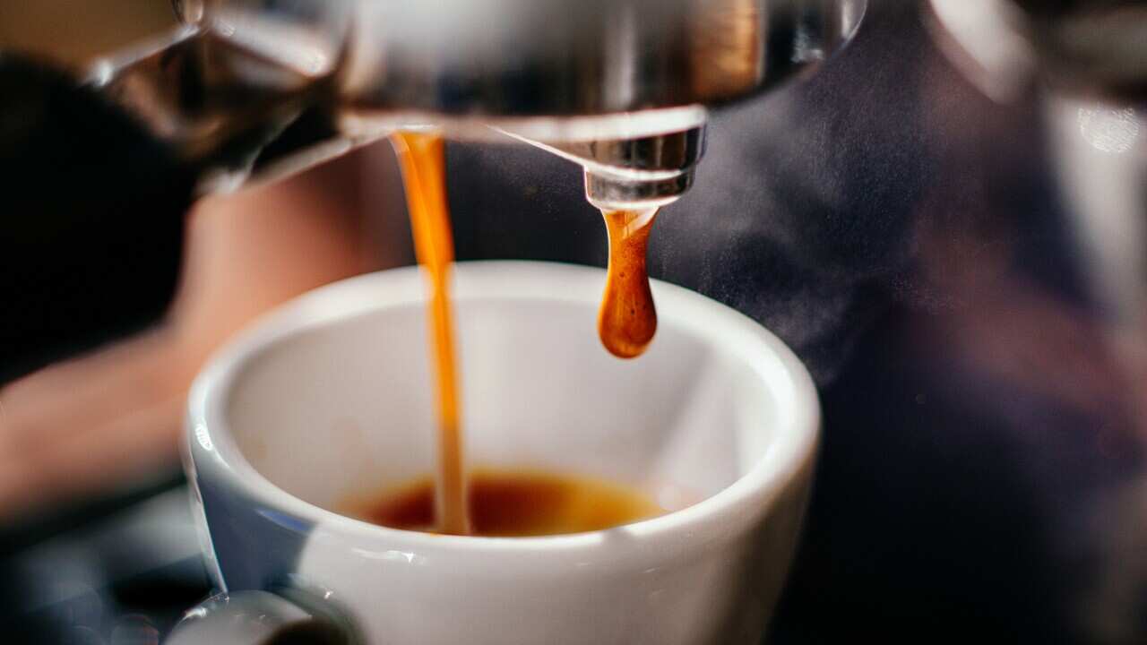 Espresso shot pouring out.