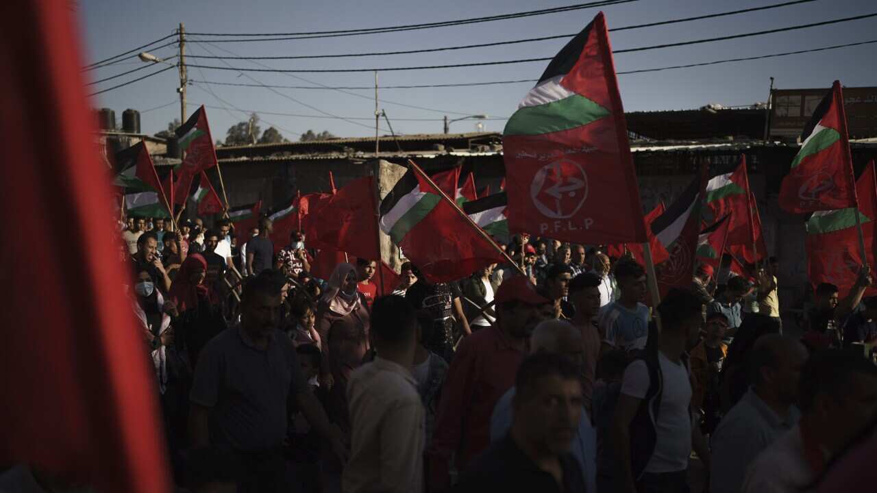 Palestinians attend a rally organised by the Popular Front for the Liberation of Palestine (PFLP), in Gaza on June 2, 2021