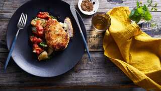 Jamón-wrapped pork schnitzel (san jacobo) with roasted capsicum salsa.